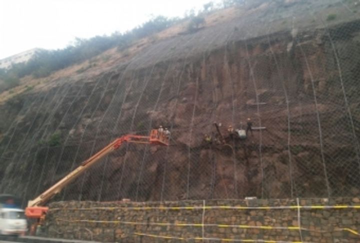 Photo 3: Rockfall mitigation and slope stabilisation measures
