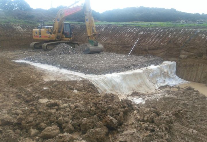 Well graded granular material placed over Mactex W2 S