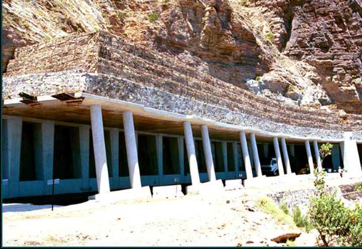 Canopy with gabion impact barrier above