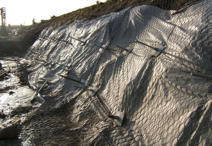 Empty Geomacs, placed on soil-nailed slope