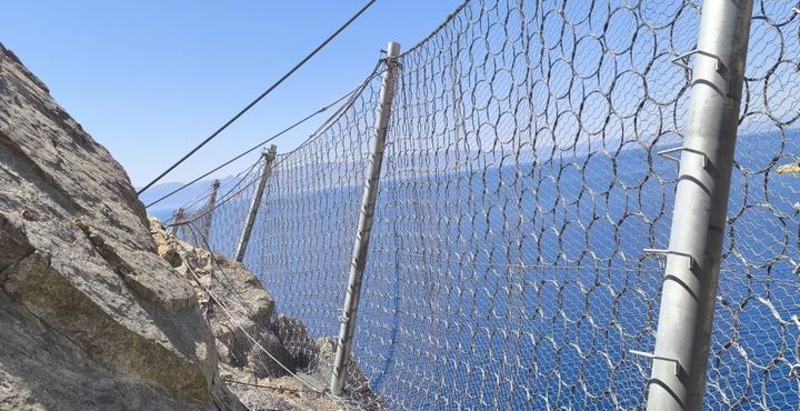 Completed rockfall protection barrier in one of the locations of the project