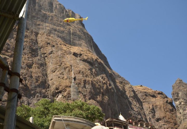Helicopter used to transfer material during installation
