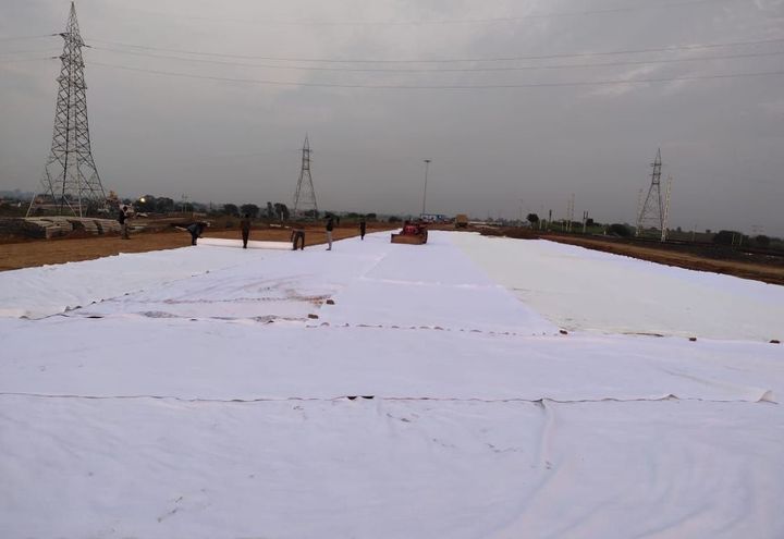 Photo 2: Laying of MacTex N at blanket & subgrade interface