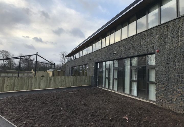 Steel sections used to support gabion cladding