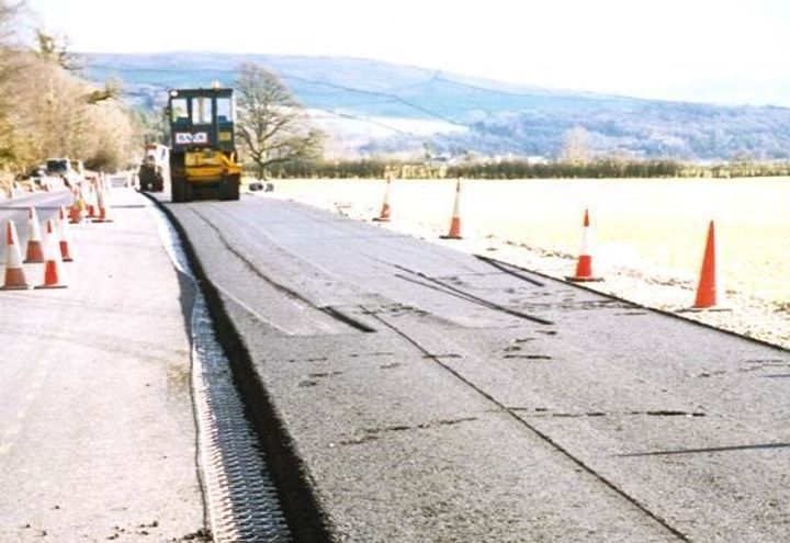 Rolling the wearing course