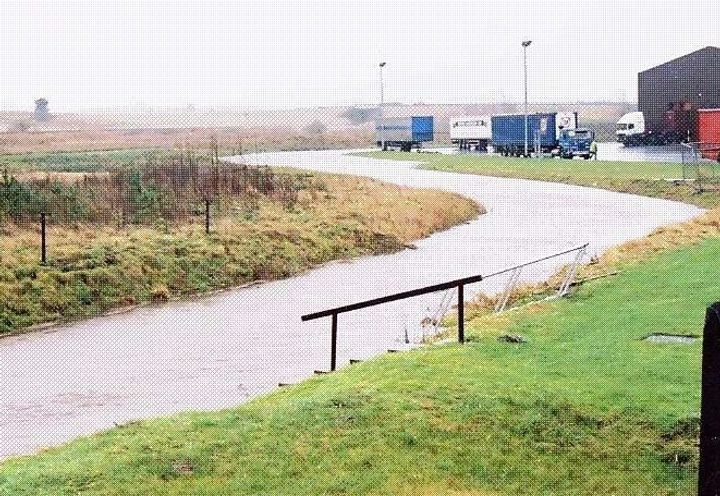 Diverted water course around new warehouse & car park
