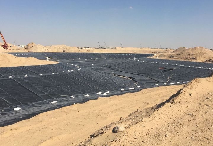 During construction: HDPE geomembrane water proofing layer installation