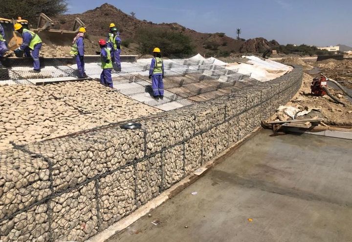 During construction: Polimac coated gabion mattress installation on side slopes