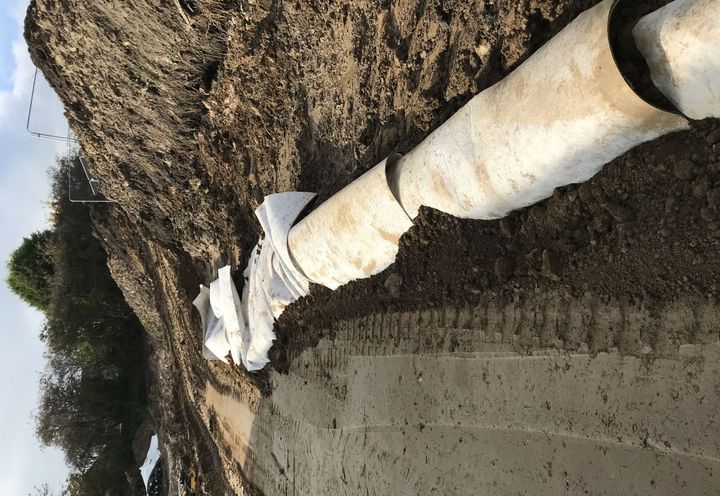 MacDrain installed between reinforced soil block & insitu soil