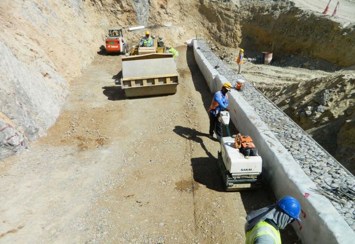 During construction: light & heavy compaction of backfill material