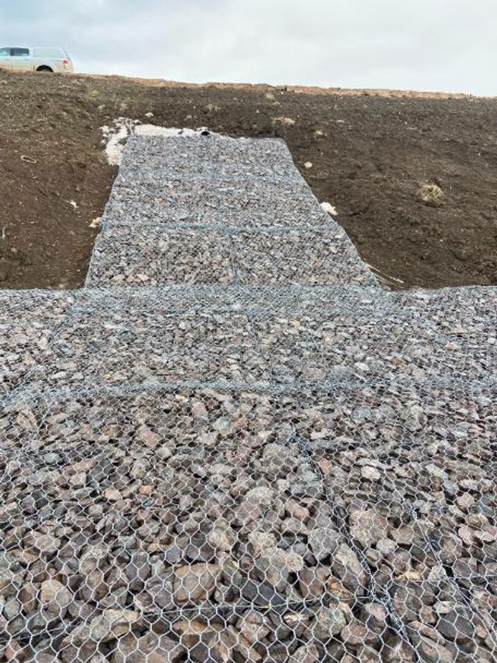  Reno mattresses installed at pond outfall.