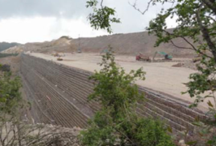 Reinforced soil wall under construction