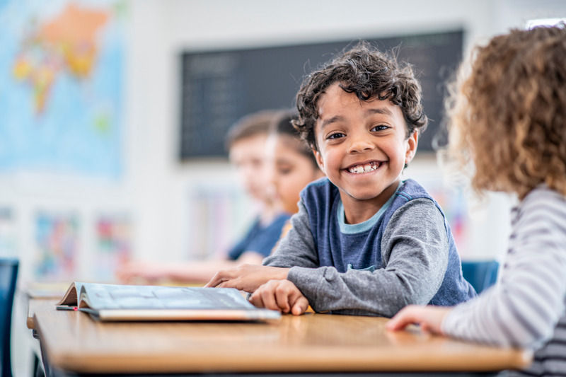Elementary Student Reading stock photo