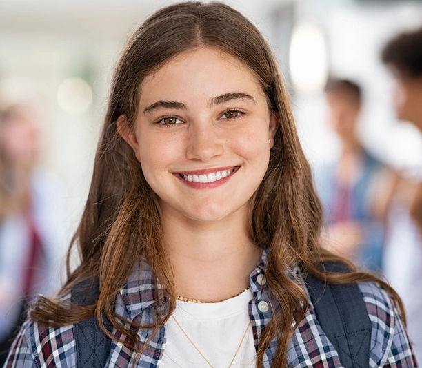 middle-school-girl-caucasian-1-1 Middle School Girl smiling at the camera