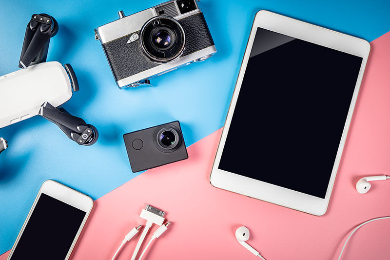 Travel gadgets and object with empty tablet screen for mock up