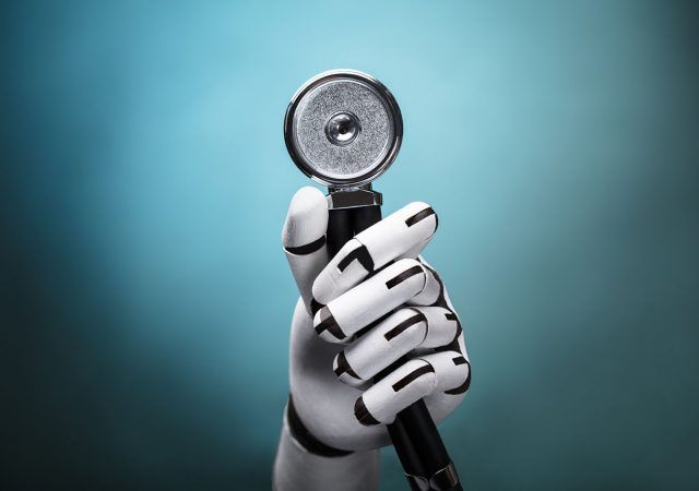 Close-up Of A Robot's Hand Holding Stethoscope On Colorful Background