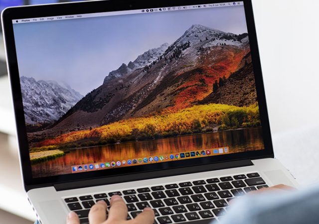 Alushta, Russia - June 8, 2017: Backgrounds MacOS High Sierra in the screen of MacBook Pro. MacBookPro was created and developed by the Apple inc.