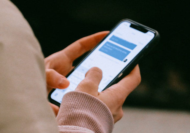 woman holding a smartphone