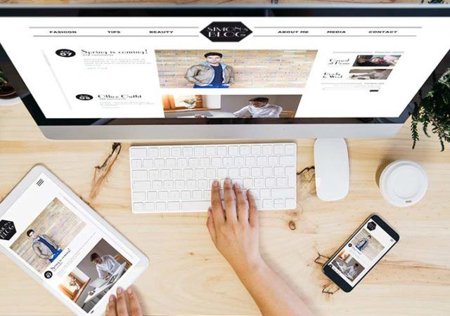 overhead desktop with blog website on devices screen
