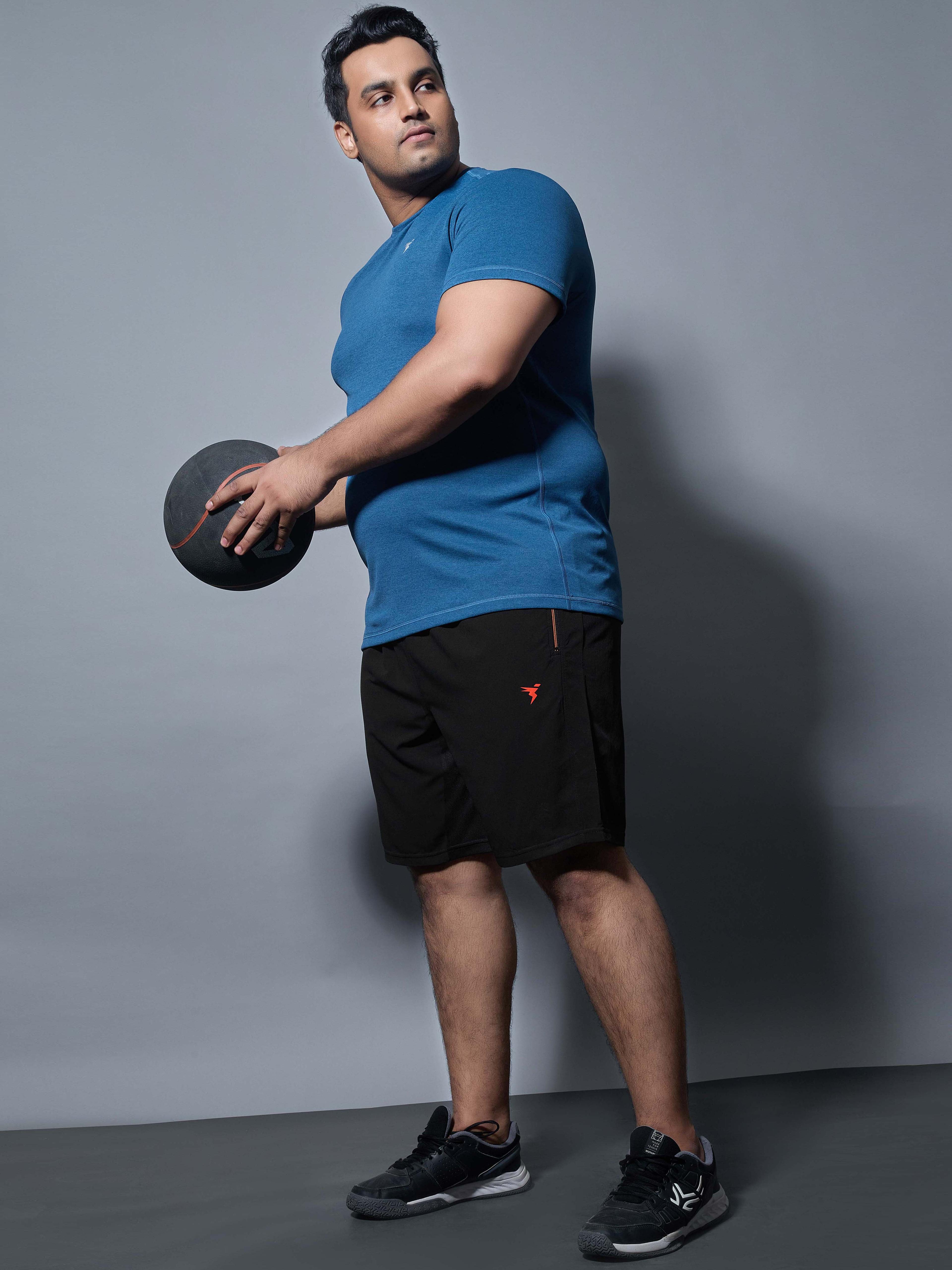 Men Solid Regular Fit Sports Shorts with TECHNOLITE
