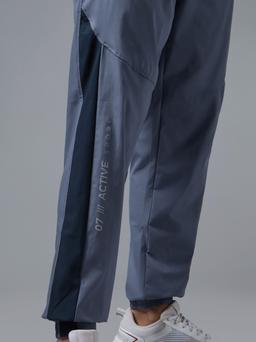 Men Solid Slim Fit Sports Joggers with TECHNOLITE in Black Smokey Olive - 4