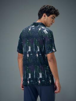 Men Printed Slim Fit Polo T-shirt with TECHNOCOOL+ in Blue Amorphous - 3