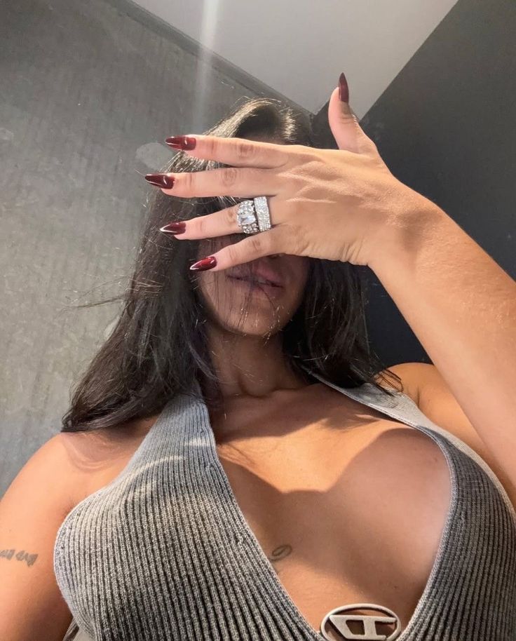 May include: A black t-shirt with a white graphic print that reads "All Our Fears can come true if we have the courage to Pursue Them."