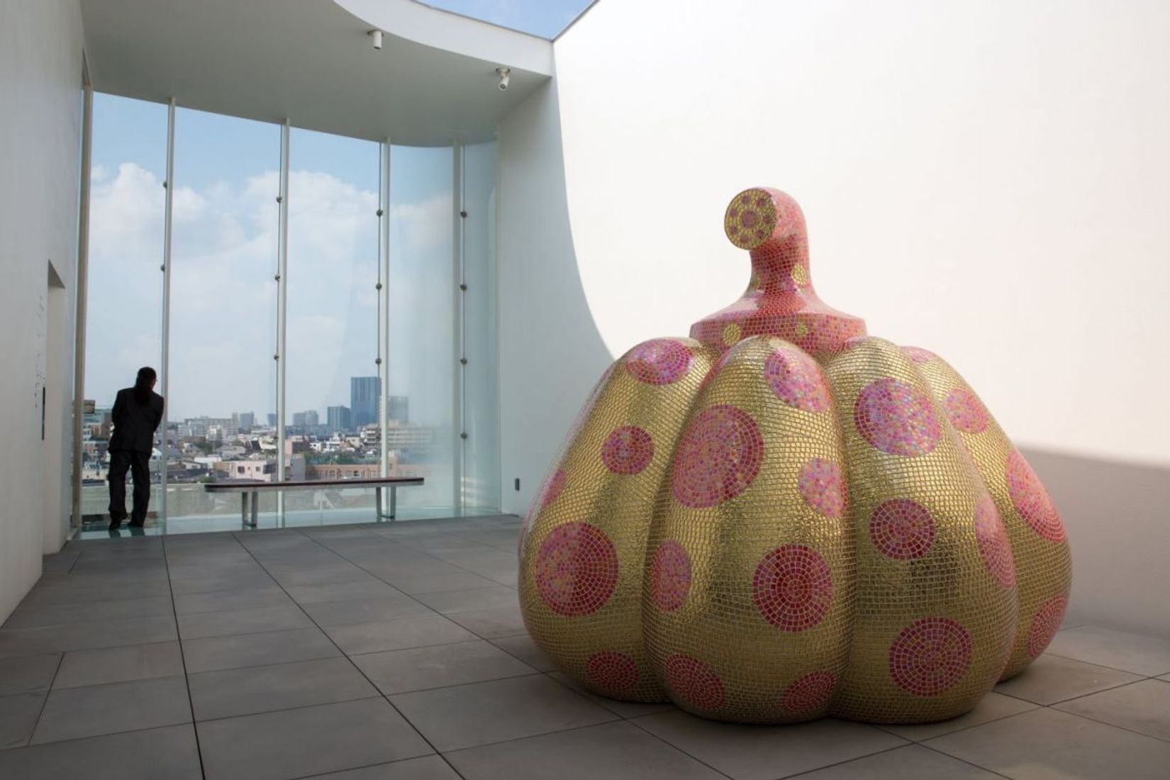 Monumental Yayoi Kusama installations at Louis Vuitton stores in