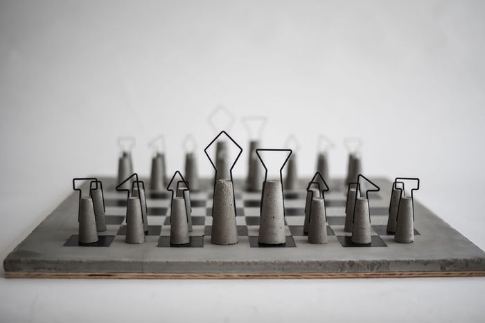 This wooden chess board inspired by 'Queen's Gambit' features pieces  modeled after the architecture of Bangkok! - Yanko Design