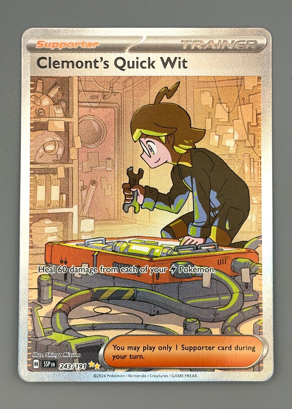 Clemont's Quick Wit 243/191 (Scarlet & Violet) - Supporter, front