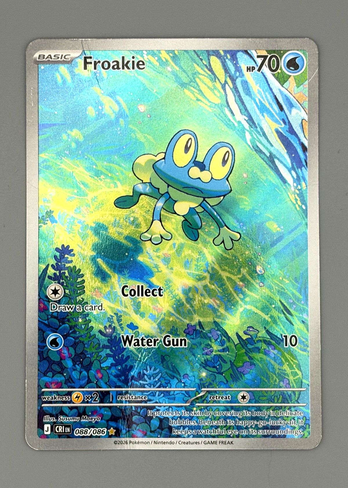 Froakie 083/086 (Scarlet & Violet) -slight crease in top left, front