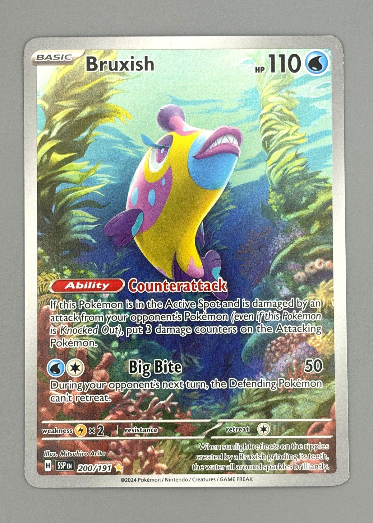 Bruxish 200/191 (Surging Sparks) - Illustration Rare, front