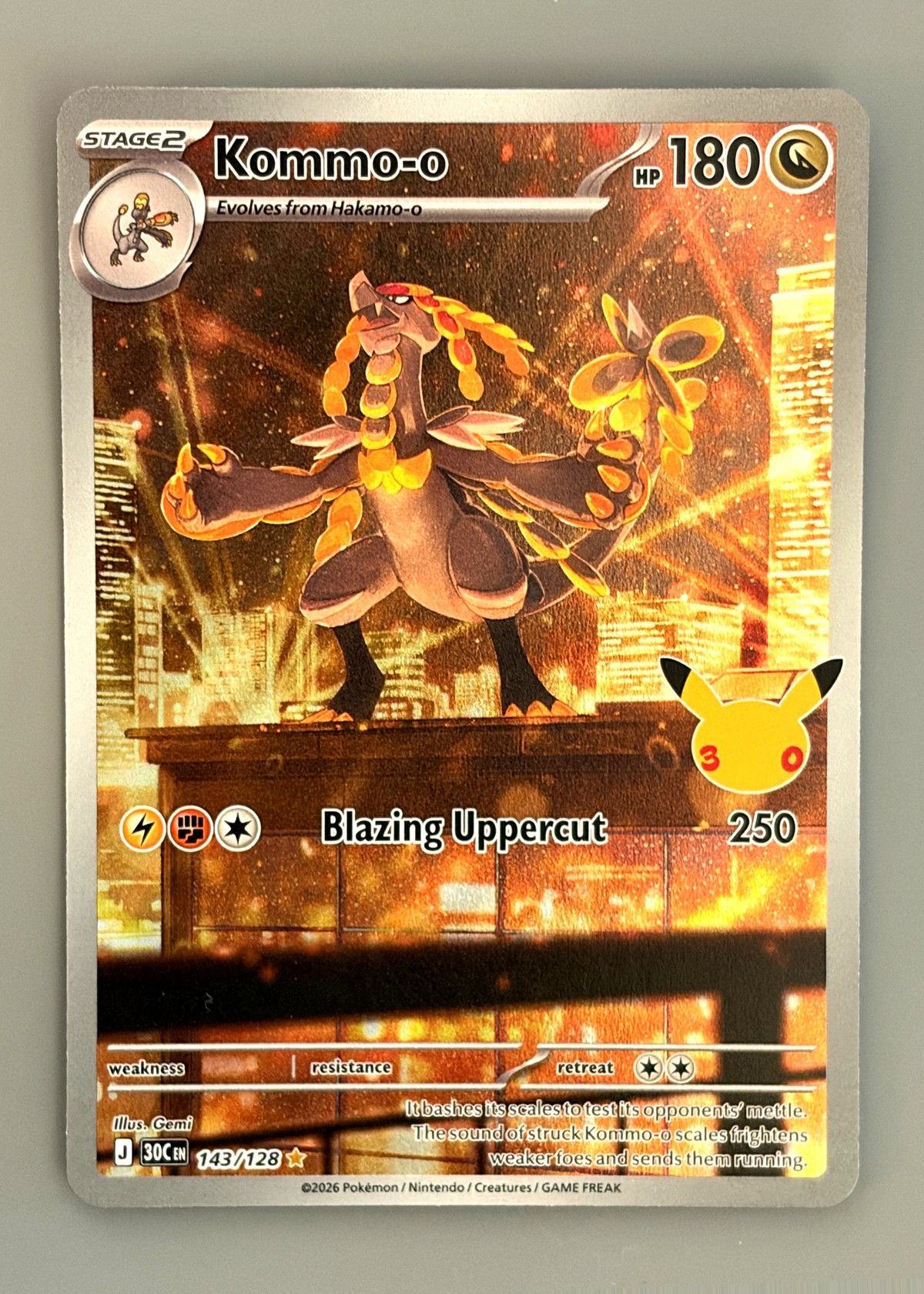 Kommo-o 143/128 (30th Celebration) - Illustration Rare, front
