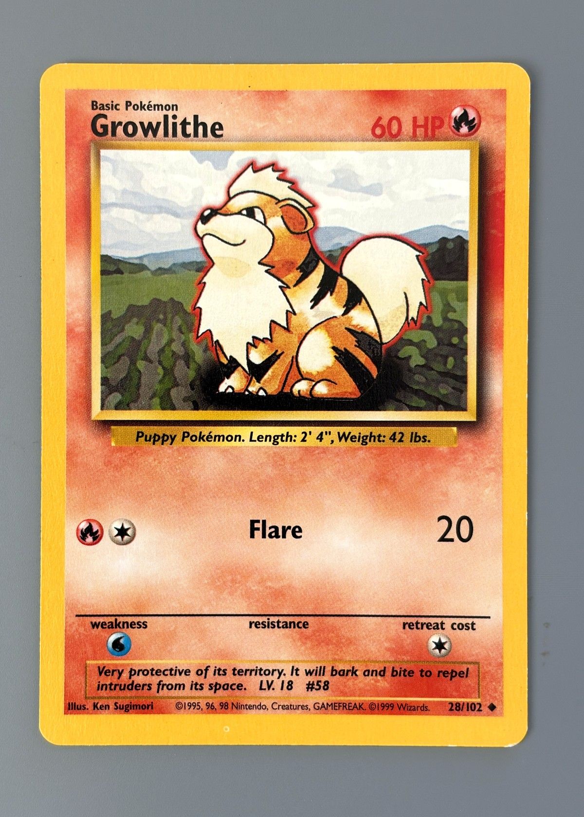 Growlithe 28/102 (Base Set) - Uncommon, front