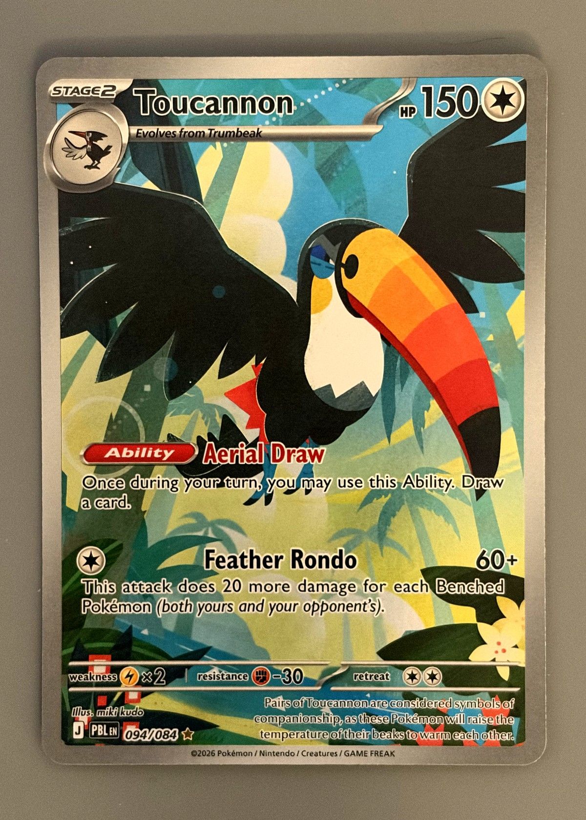 Toucannon 094/084 (Pitch Black) - Illustration Rare, front