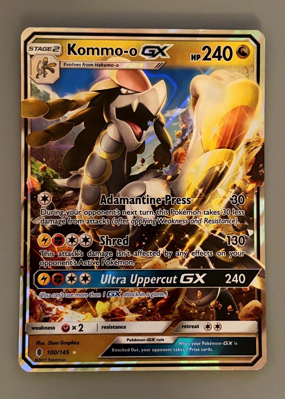 Kommo-o GX 100/145 (Guardians Rising) - Ultra Rare, front