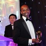 Navi Radjou accepts the 2013 Innovation Award from Fujitsu