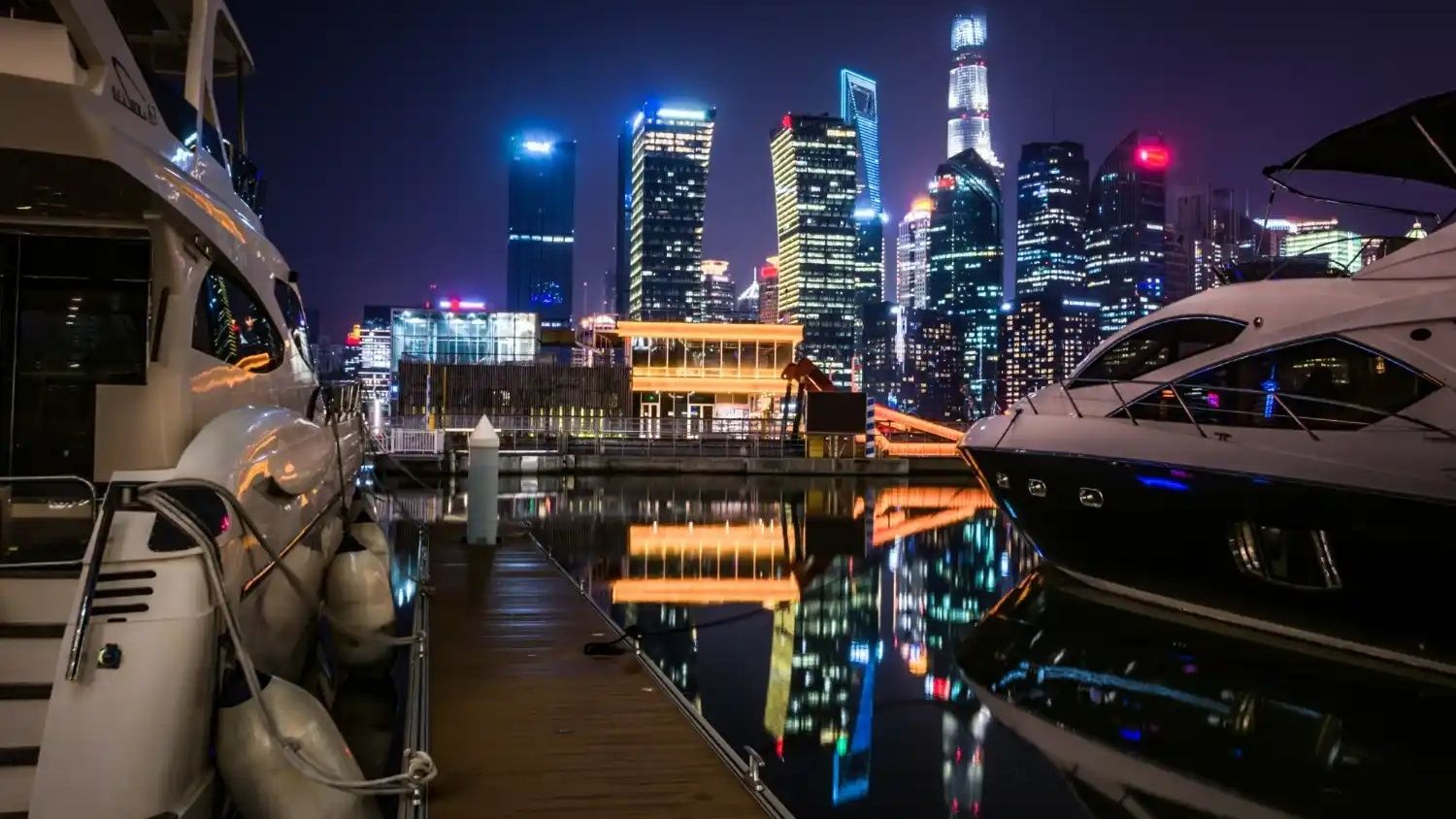 Dubai night experiences including desert safari and luxury yacht with city skyline lights