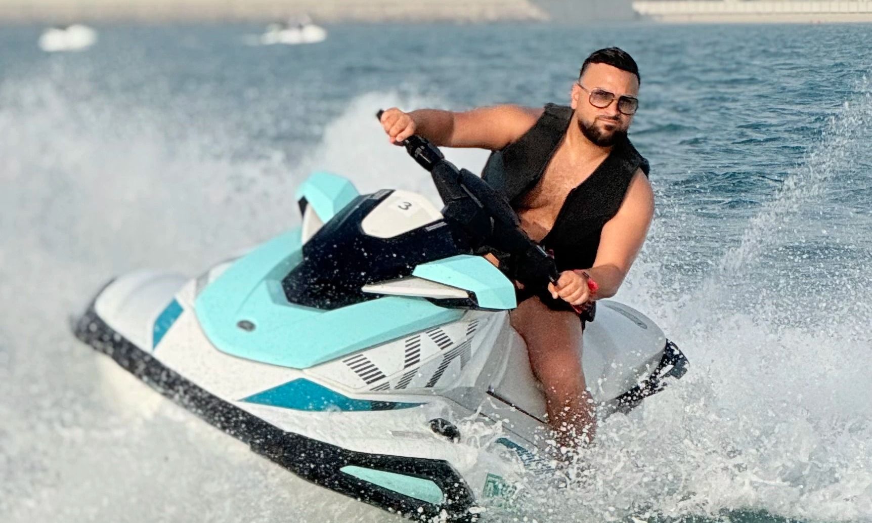 Dubai jet ski rental adventure showing speed, waves, and iconic landmarks.