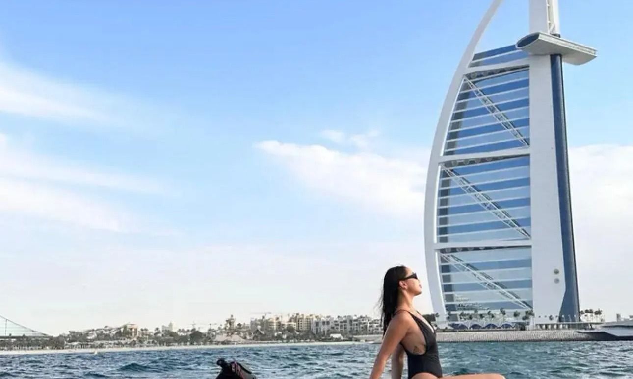 Couple on a jet ski tour in Dubai with stunning views of the city’s skyscrapers.