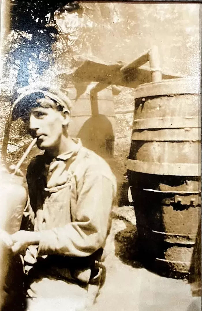Dave Johnson at his Distillery - approx 1915