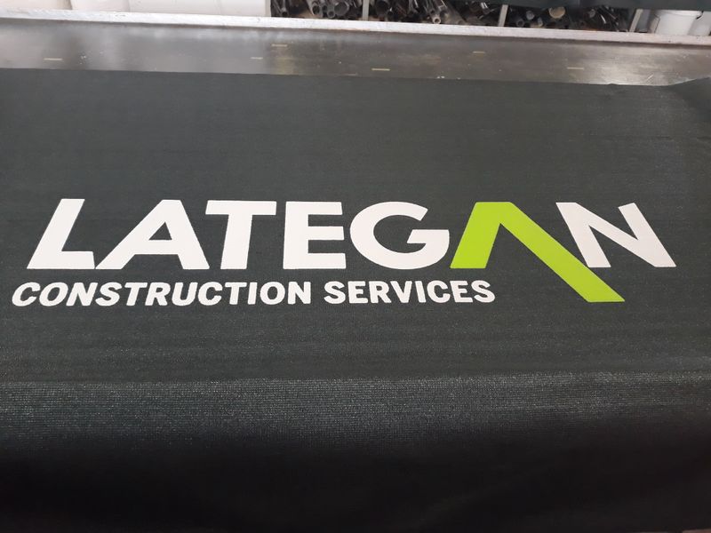 Branded site hoarding in printed shadenet