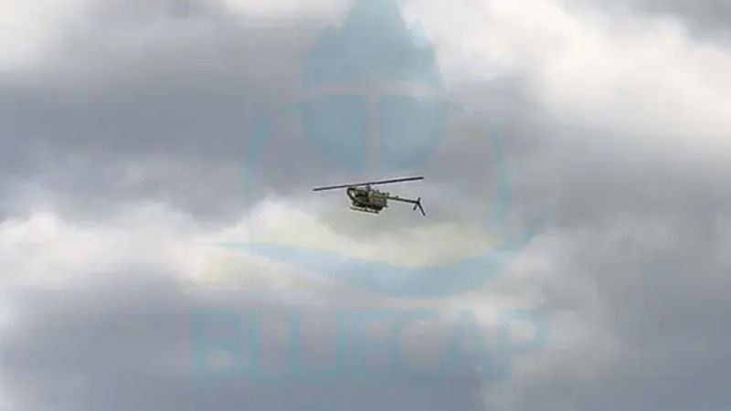 BlueCapHeli® flying with integrated survey equipment