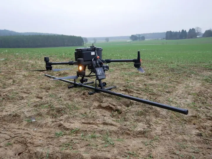 Official SENSYS MagDrone R4 rigid boom magnetometer system mounted to a multicopter