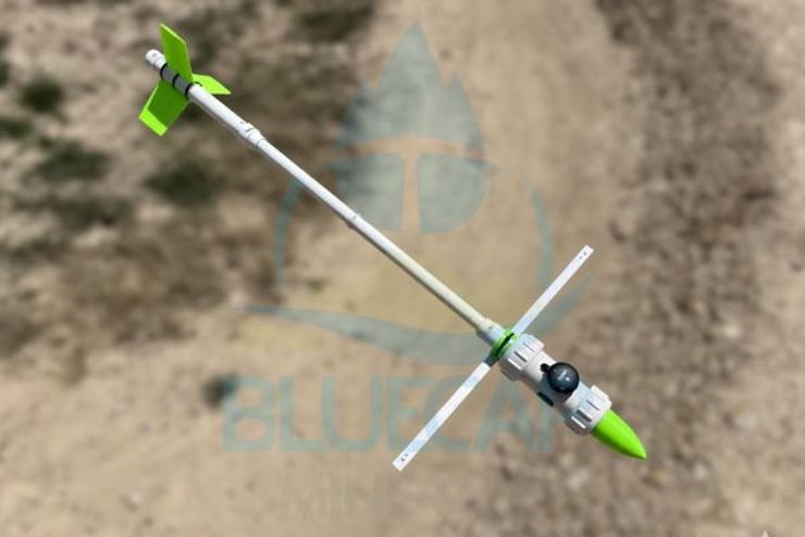 BlueCapBird Light with a white body and green tail suspended on its tow line