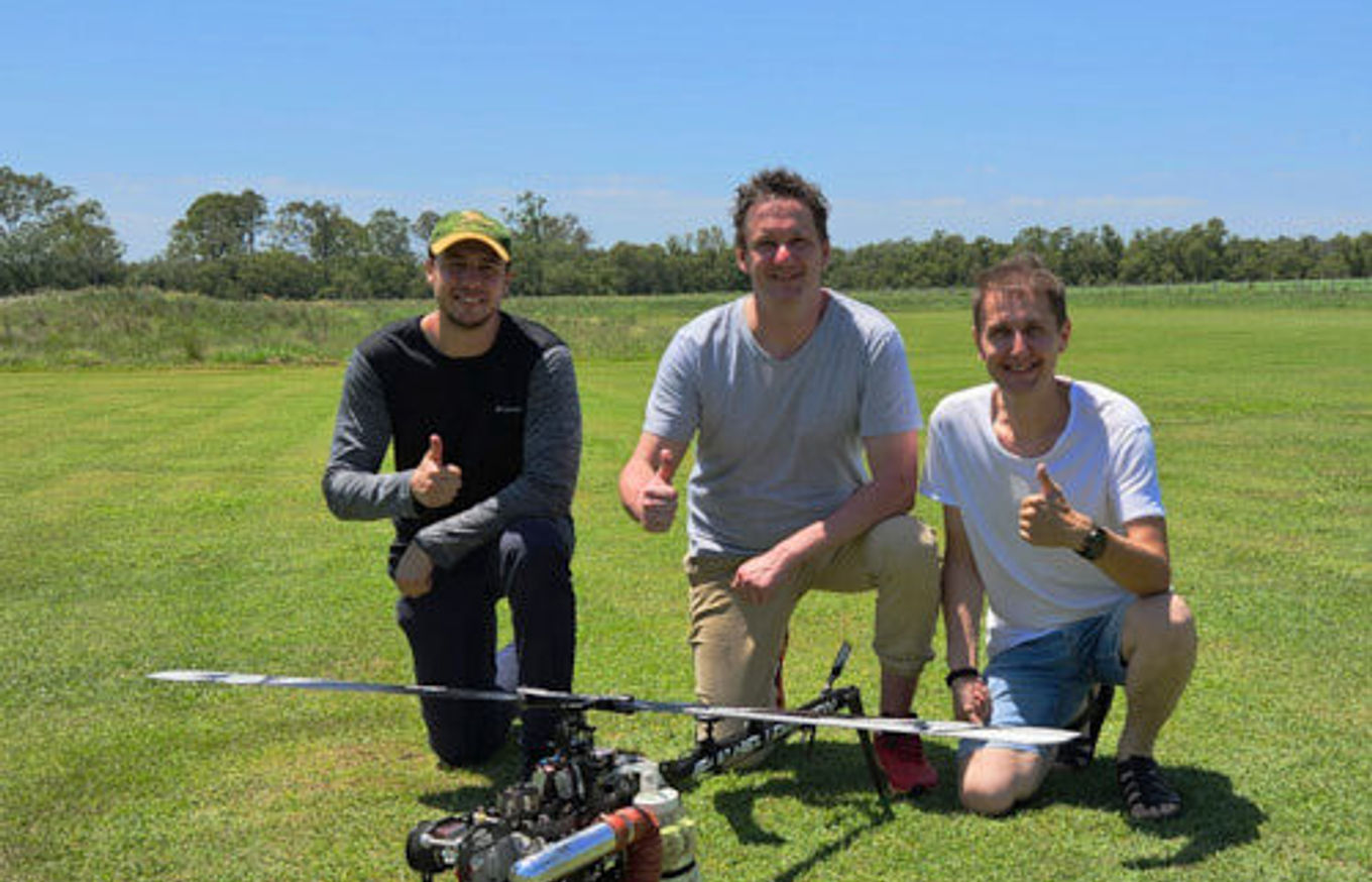 BlueCap airborne geophysics field team operating survey equipment in Australia