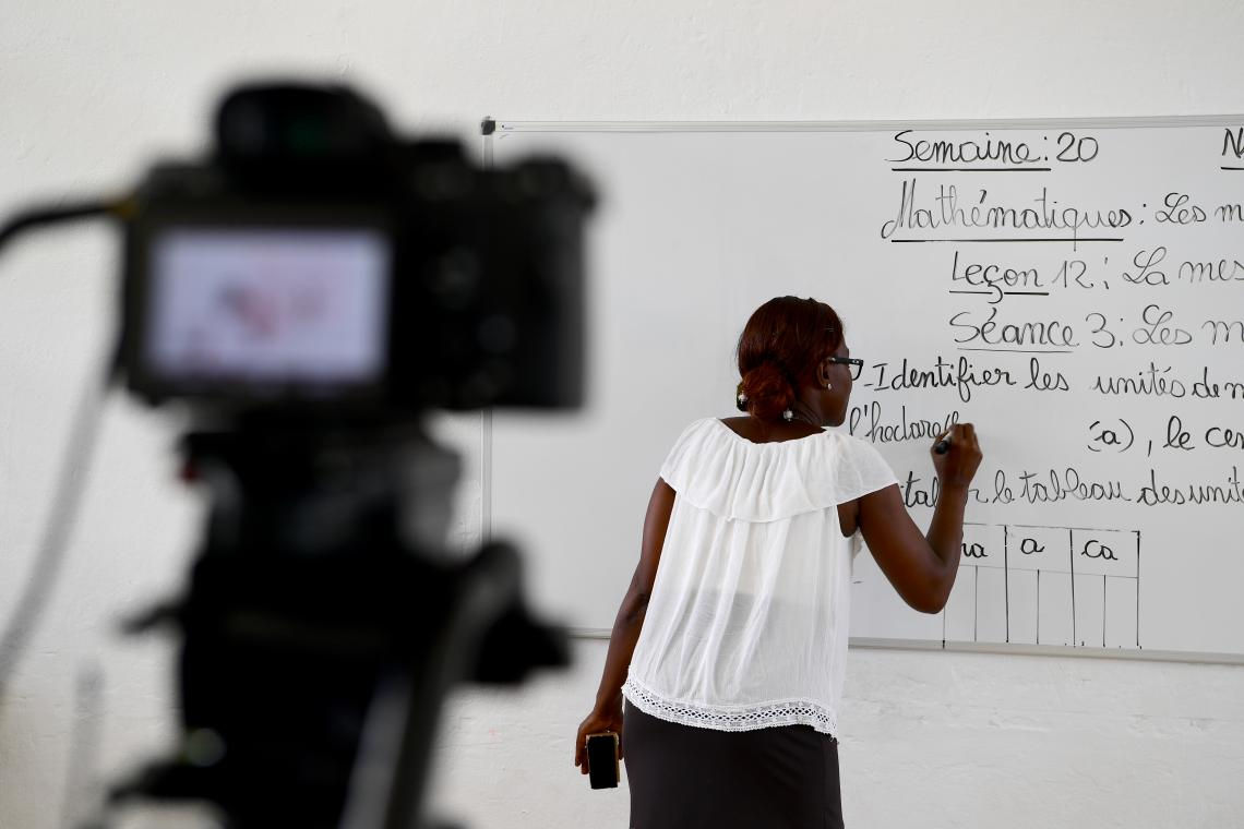 A teacher conducts a lesson that is being videotaped for broadcast on national television. Image Credit: UNICEF/UNI317268/Frank Dejongh<br>