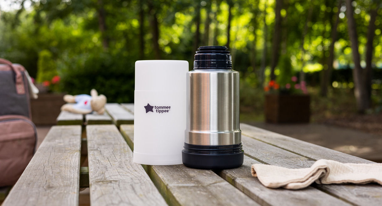 Travel Bottle and Food Warmer on an outdoor picnic table