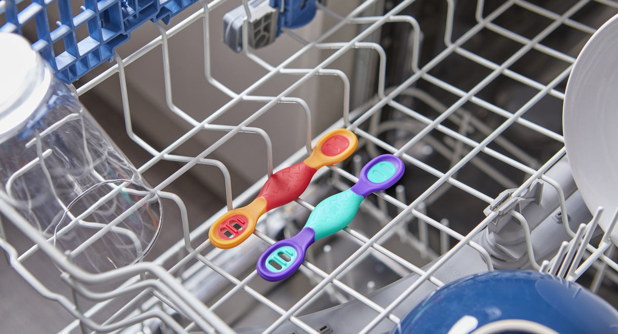 Cutlery and tableware placed into washing machine