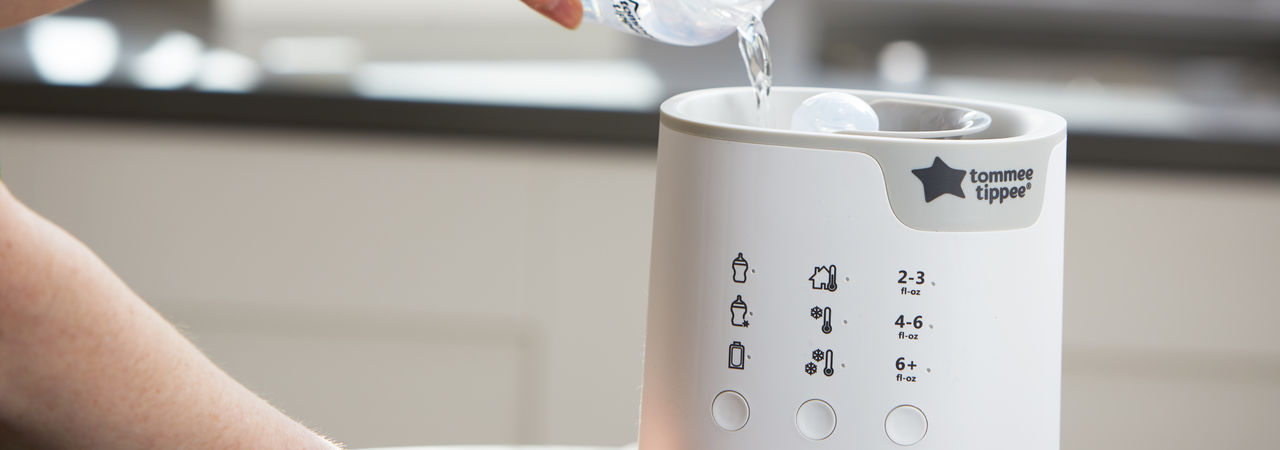 Water being poured into Multiwarm Intuitive Milk Warmer